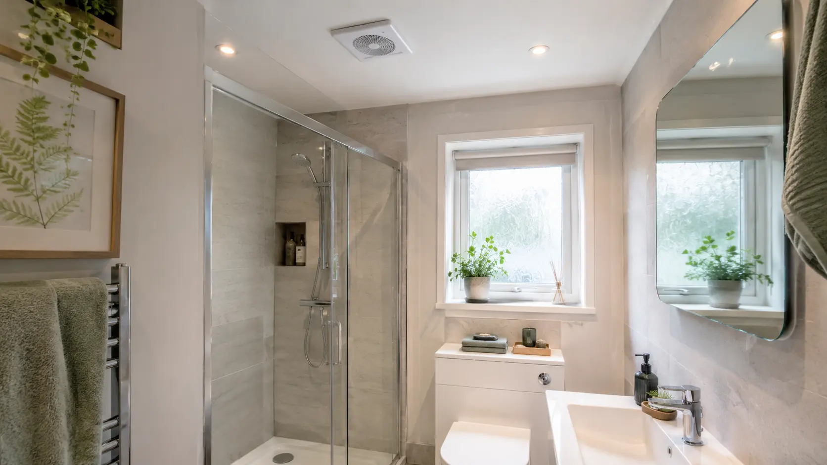 Compact shower room with a ceiling extractor fan