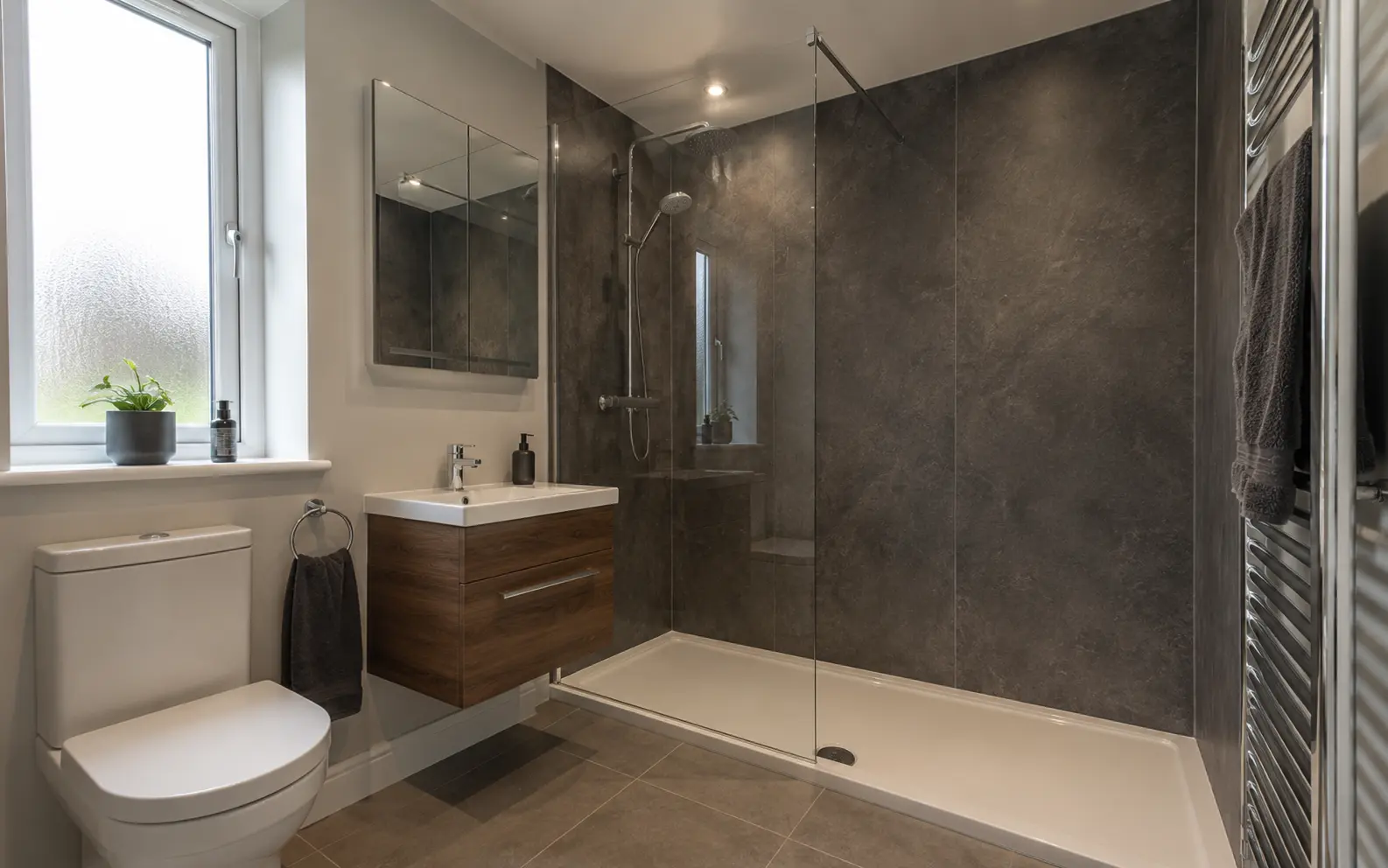 Modern shower room finished with stone-effect wet wall panels