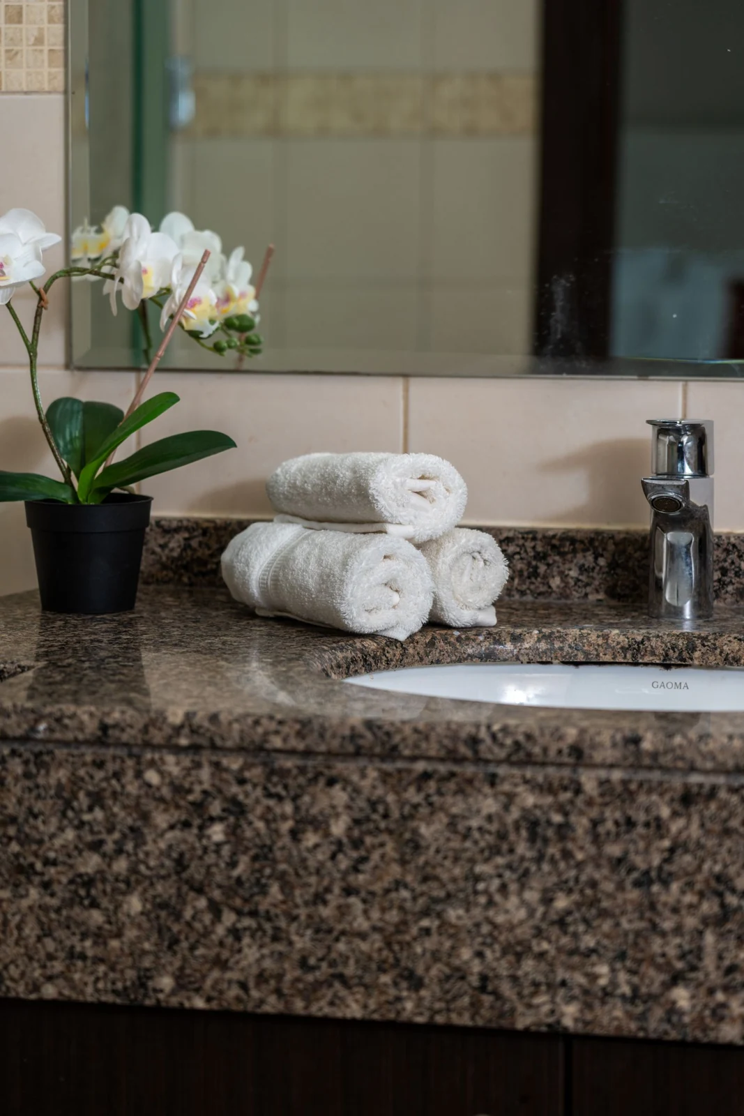 Bathroom towels on a vanity countertop